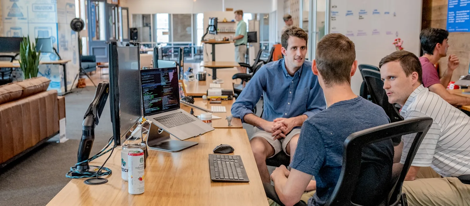 A team collaborating in a modern open-plan office