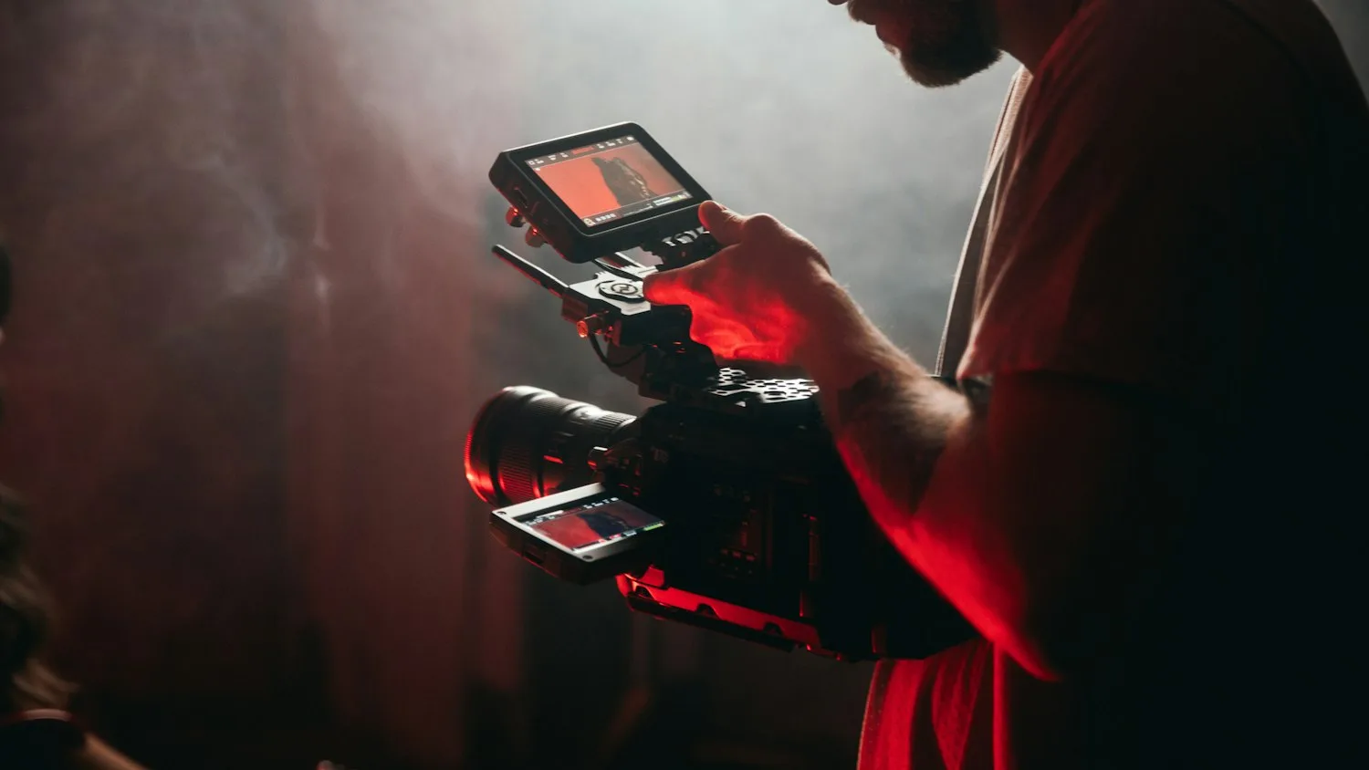 A content creator setting up a camera to film